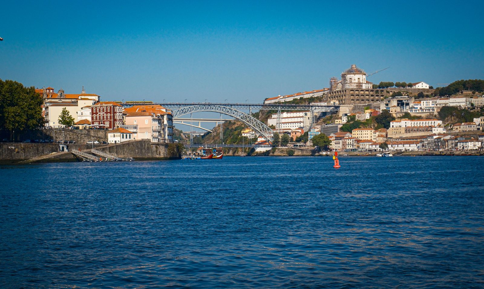 Dom Luís I Bridge arching over the Douro between Porto and Vila Nova de Gaia, seen on the best Douro river cruises
